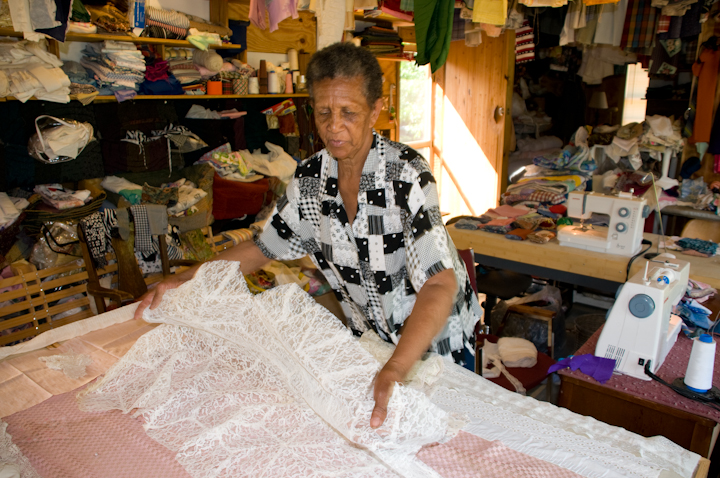 Mozell Benson assessing her pieces for a lace quilt, Opelika, Alabama, June 5, 2008, photograph by Alan Govenar